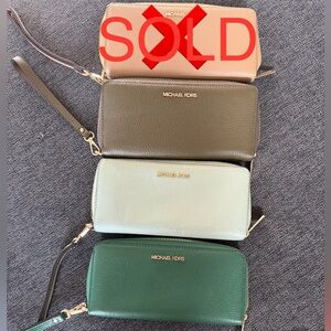 3 Michael Kors Women's Leather Wallets - 1 of each color - 30 each